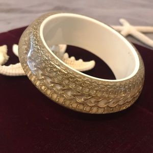 Chunky gold “chains” bracelet.